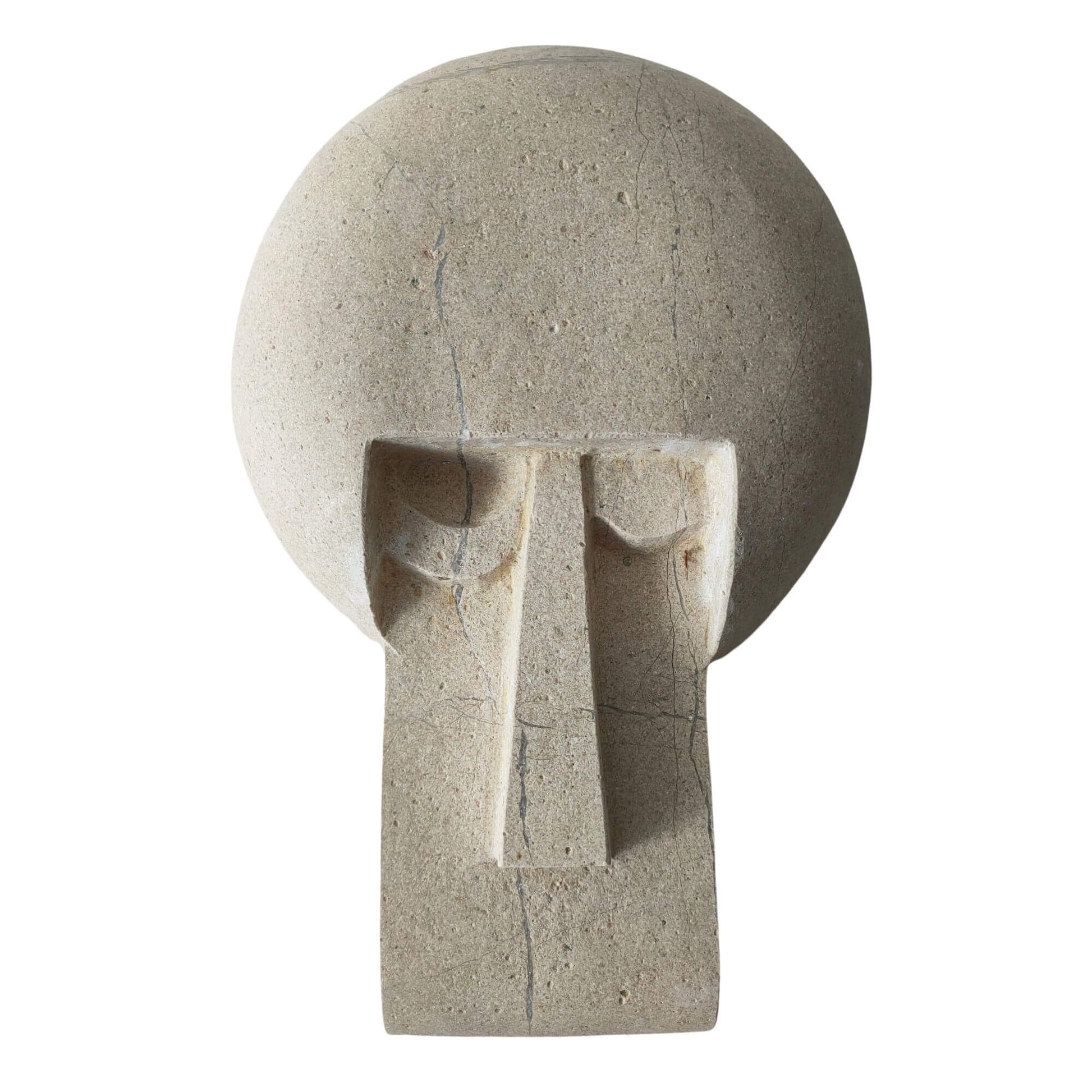 Maschera decorativa artigianale in pietra naturale di Bisaccia, scolpita a mano in calcare.